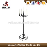 Metal large floor candelabra in antique rust